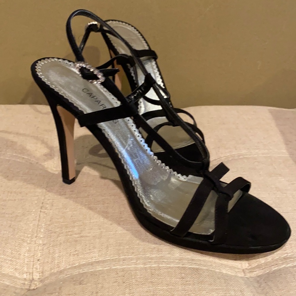 Black 4 1/2 inch high heel size 9 strap sandal worn 1 time
